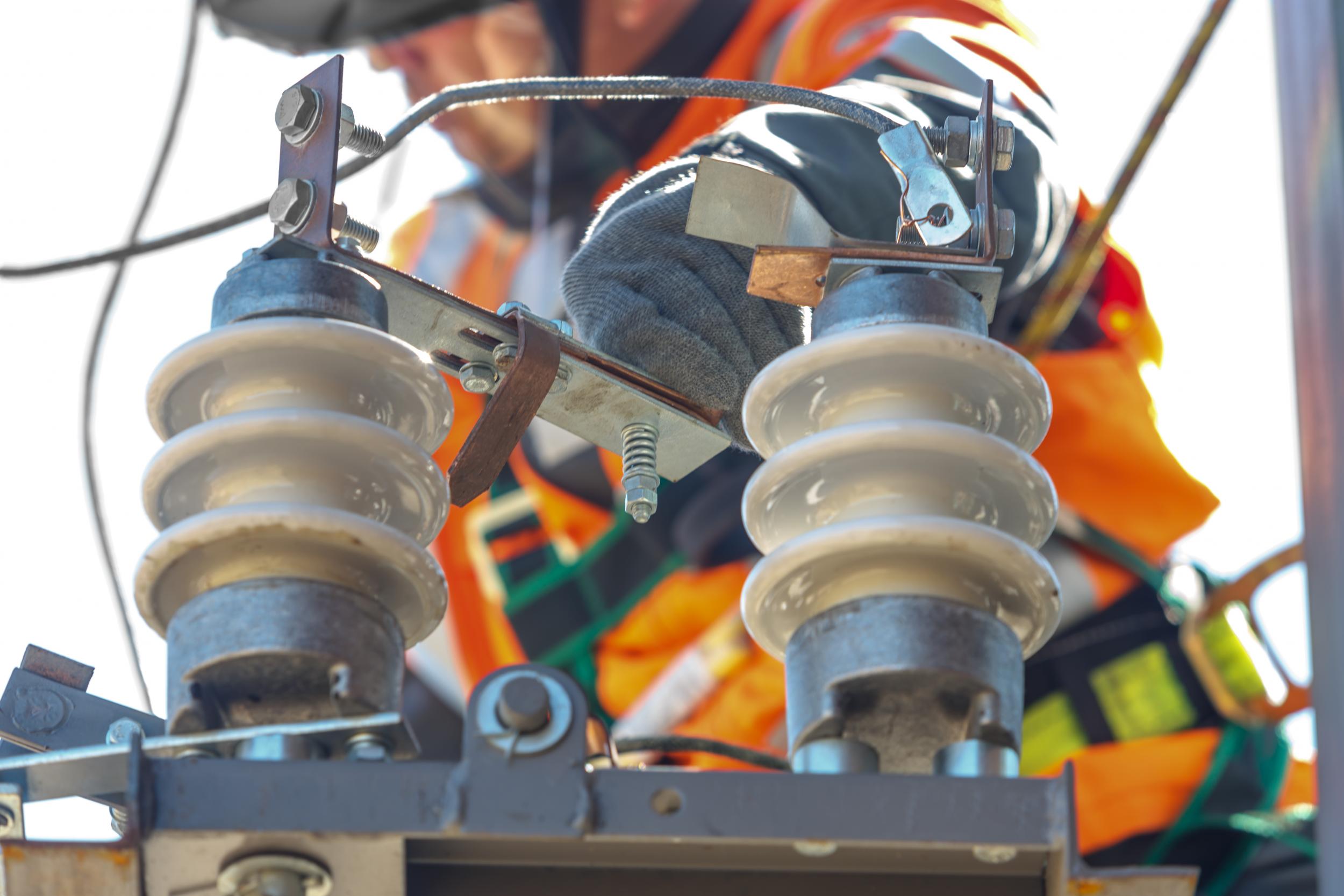 A lineman working on a powerline